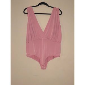 Pink sleeveless body suit